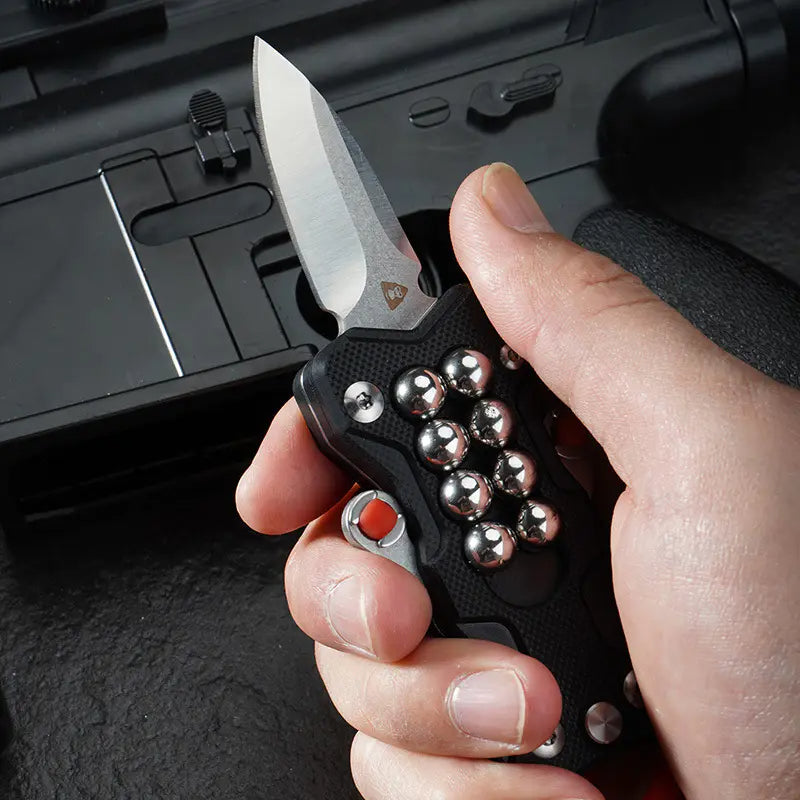 New G10 handle slingshot folding knife